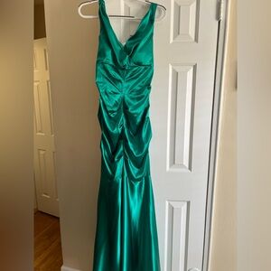 XSCAPE MAXI DRESS SIZE 14 fits like a 12. Has a few pulls as shown in the images